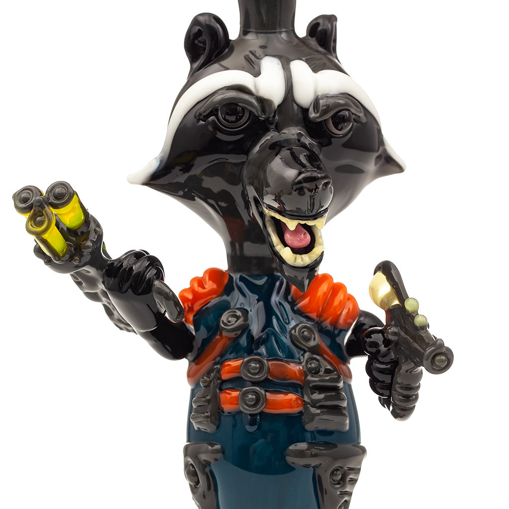 Close up studio photo of R3G15 sculpted glass rendition of Rocket the Raccoon, a character from the movie Guardians of the Galaxy. 