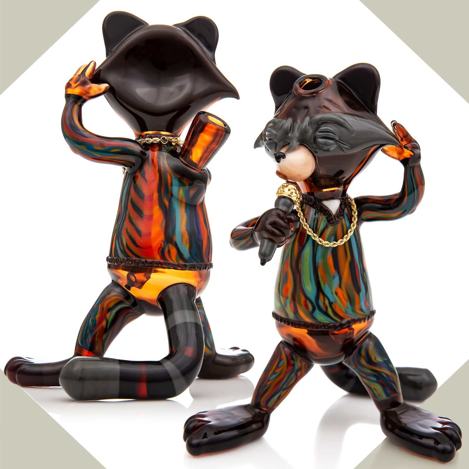 Studio Photo showing two different angles of R3G15 collab with AAA (Ashley Ann Austin) Racoogi, a raccoon wearing a coogi sweater and singing from a gold plated microphone, wearing a gold chain. 